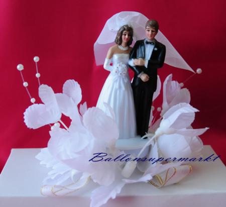Tischdekoration, Hochzeitstorten-Dejoration, Hochzeitspaar in weißen Blüten
